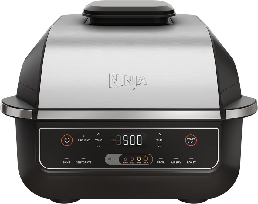 Sleek black and silver multi-function indoor grill with a digital display, alongside a compact matching air fryer.
